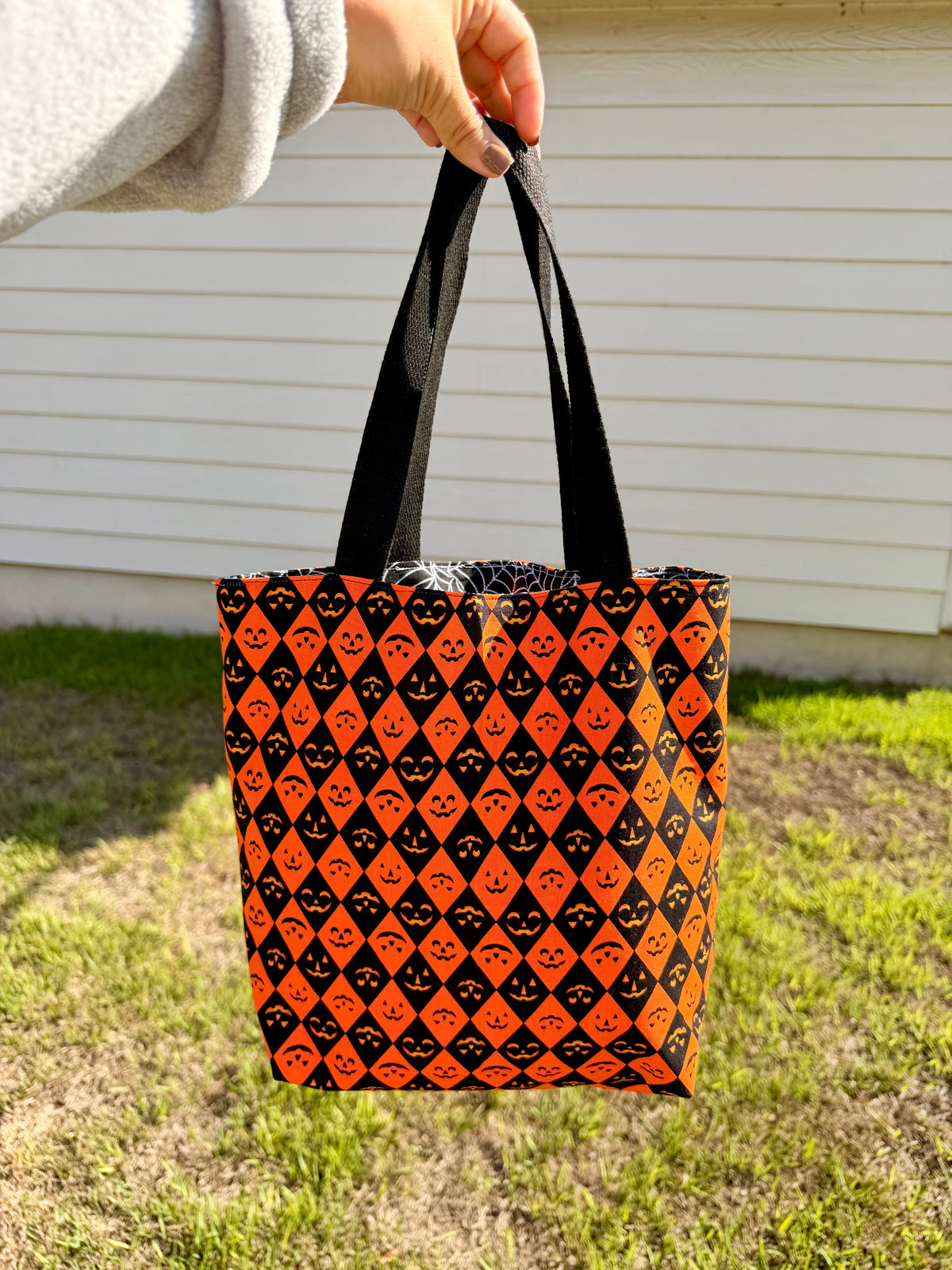Reversible trick-or-treat tote